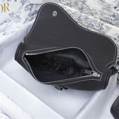 saddle bag black grained calfskin with dior and shawn signature|black grained calfskin saddle bag.